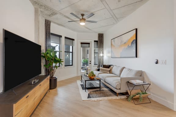 a living room with a couch and a tv