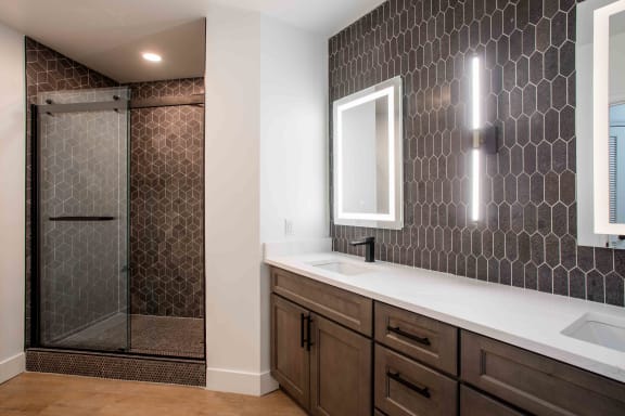 a bathroom with a sink and a shower