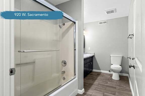 Full bathroom with tub shower combo and vanity at OSM Properties Homes & Apartments, Chico, CA