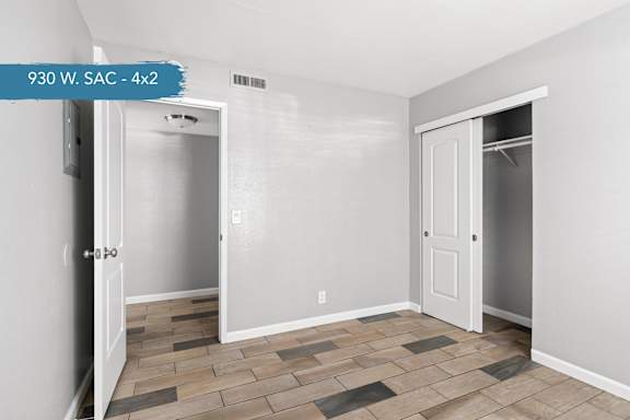 A room with a door and a window.