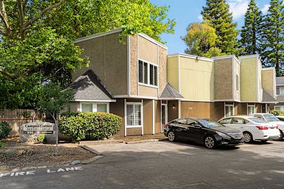Exterior building with parking and fire lane at OSM Properties Homes & Apartments, Chico