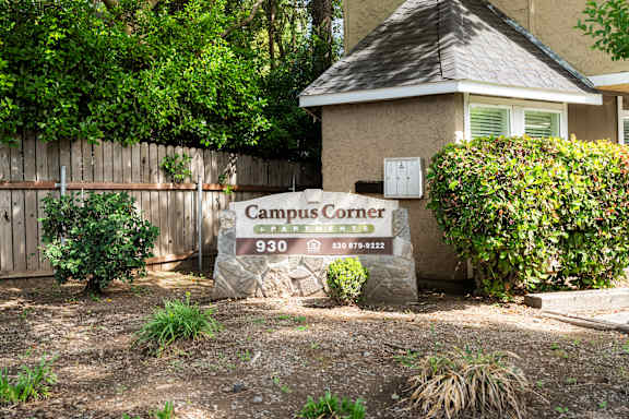 Property entrance sign with landscaping at OSM Properties Homes & Apartments, California, 95926