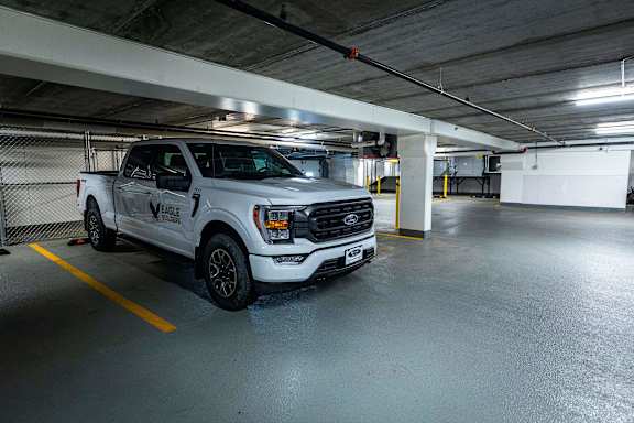 a police truck parked in a parking garage