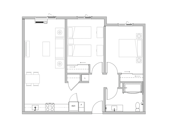 A floor plan of a house with a kitchen, living room, and bathroom.