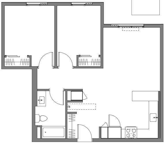 A black and white floor plan of a house with a kitchen, living room, and bathroom.