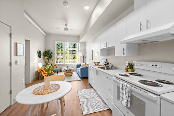 White kitchen with round table at Terracina Vista, Portland