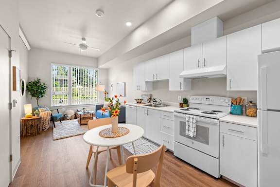White kitchen with table and chairs at Terracina Vista, Oregon, 97233-4299