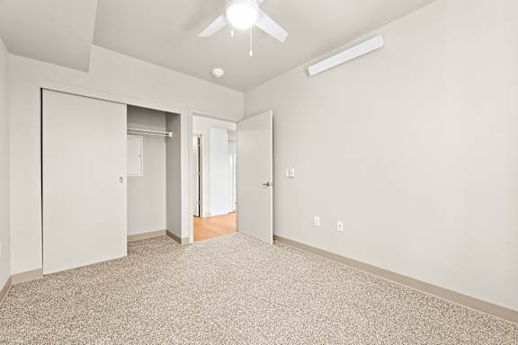 Spacious room with a ceiling fan at Terracina Vista, Portland, OR 97233-4299