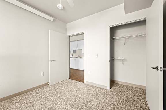 Room with carpeted floor and ceiling fan at Terracina Vista, Portland Oregon