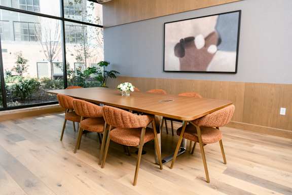 Long Conference room with table and Brown chairs at Anthem House, Huntsville, 35806