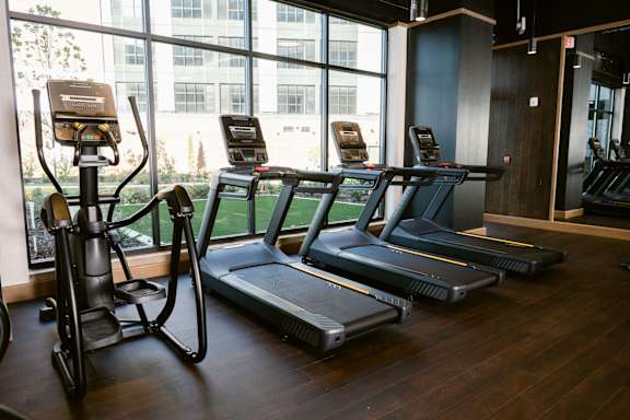 Gym with treadmills at Anthem House, Huntsville, AL