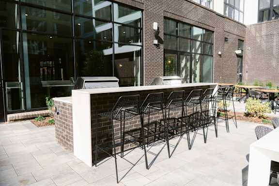 Outdoor kitchen with BBQ at Anthem House, Alabama, 35806