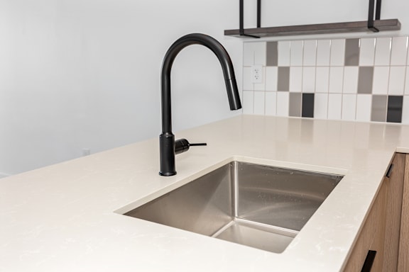 Modern kitchen sink at Anthem House Apartments, Alabama