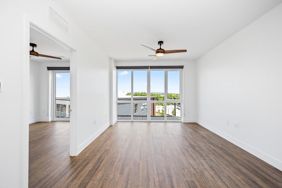 Spacious room with large window at Anthem House Apartments, Alabama