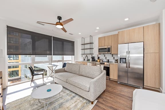 Wood Floor Living Room at Anthem House Apartments, Huntsville, AL 35806