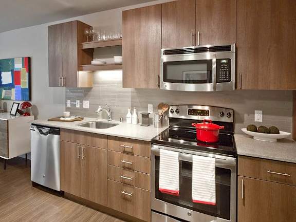 Kitchen Designed With Ample Storage Space at Astro, Seattle, WA