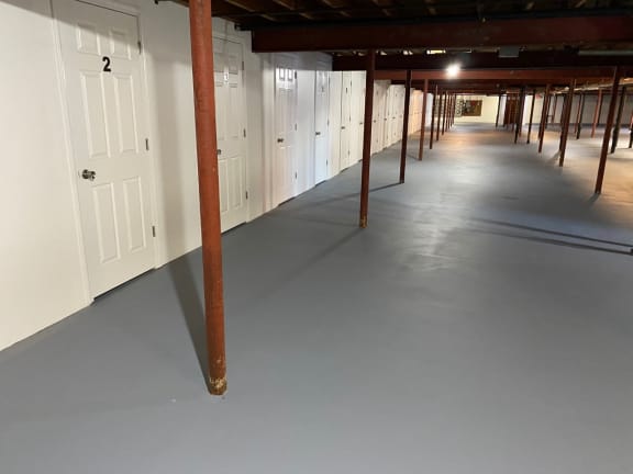 a large room with many closets and doors in it