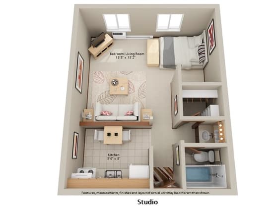 A studio apartment layout with a bedroom, living room, and kitchen.