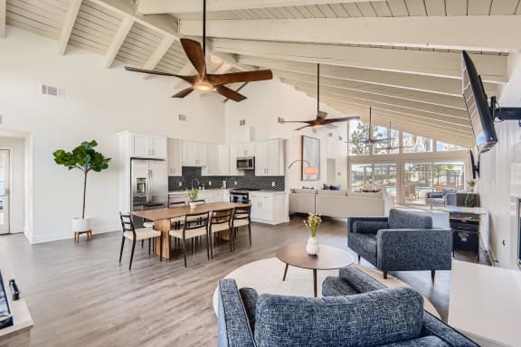 Clubhouse with Spacious Tables and Cozy Chairs at Azul Apartments in Hemet, 92545