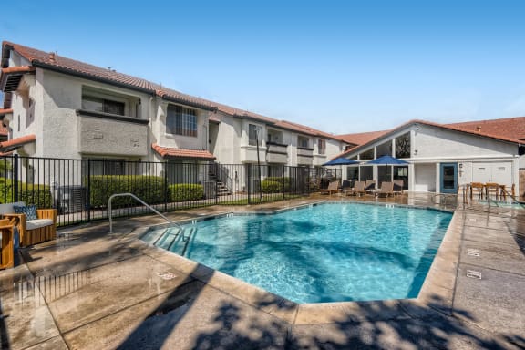 Swimming Pool View with Apartments in the Background at Azul Apartments in Hemet, 92545