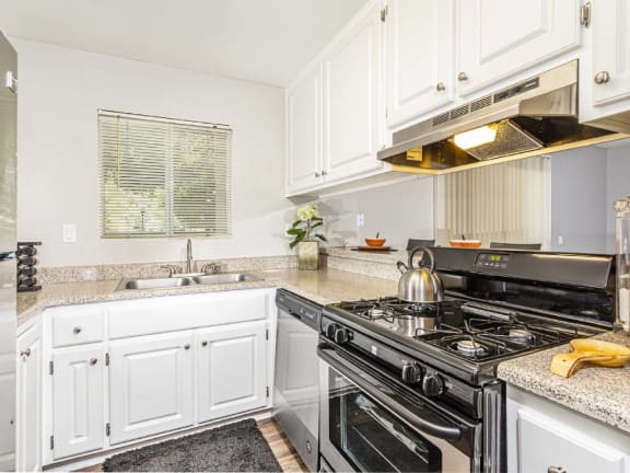 Kitchen with Gas Range at Carmel at the Colony, Ontario