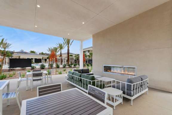 Fireside lounge outside the pool area of The Park Apartment homes