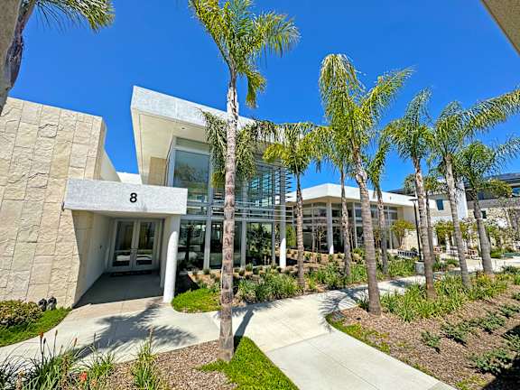 Gorgeous office exterior at The Max with luxurious landscaping