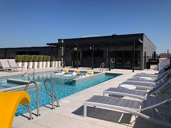 Rooftop Pool, Sundeck, Multi-Screen Television at 1400 Russell Apartments, Missouri