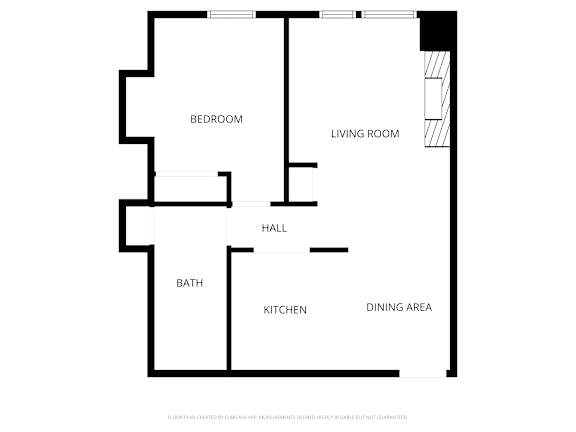 A black and white floor plan of a house with labeled rooms.