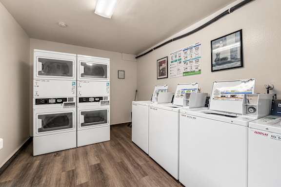 On site laundry facility with multiple machines at Shorehaven Townhomes Apartments, Ventura, CA