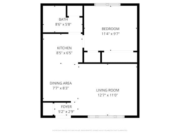 Floor Plan  A floor plan of a house with a living room, dining area, kitchen, bathroom and bedroom.