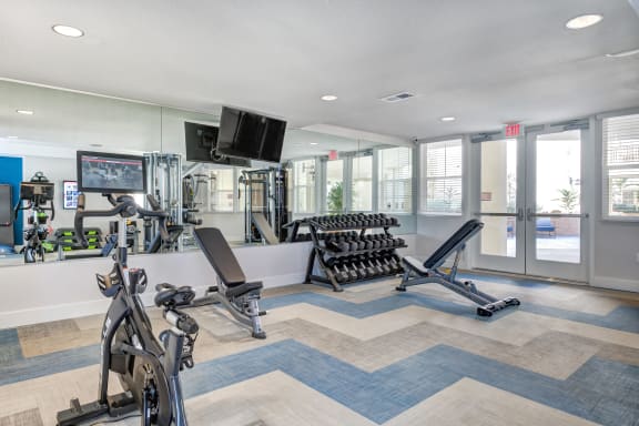 the gym at the bradley braddock road station apartments
