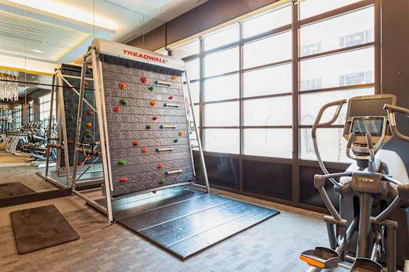 a gym with a punching bag and exercise equipment