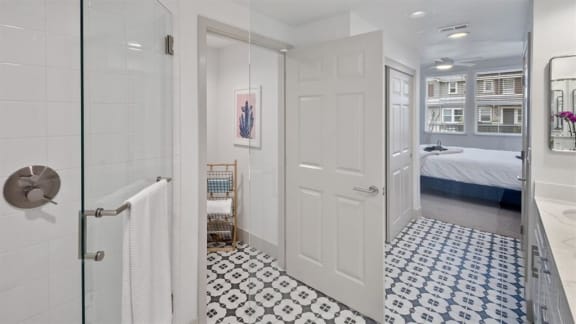 Walk-In Showers With Built-In Bench And Glass Enclosure at Arrive Los Carneros II, California, 93117