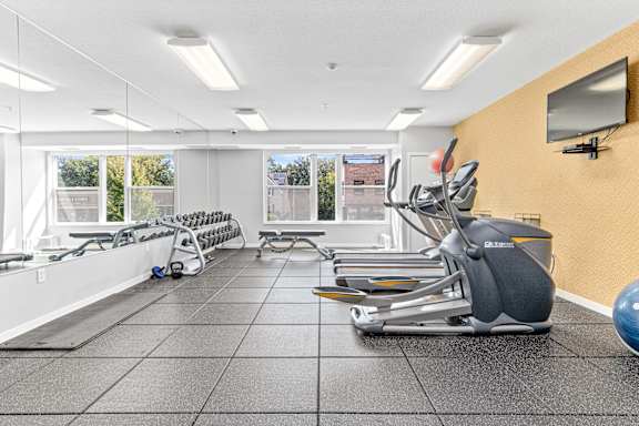 Gym with exercise equipments at Elements of Linden Hills, Minneapolis