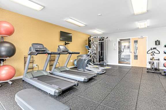 Gym with cardio equipments at Elements of Linden Hills, Minneapolis, MN