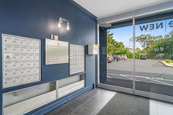 the entrance to a wii game room with a glass door at ReNew Aurora, Aurora, IL, 60506