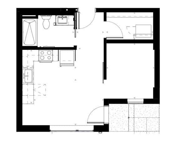 A black and white floor plan of a house with a kitchen, living room, and bathroom.