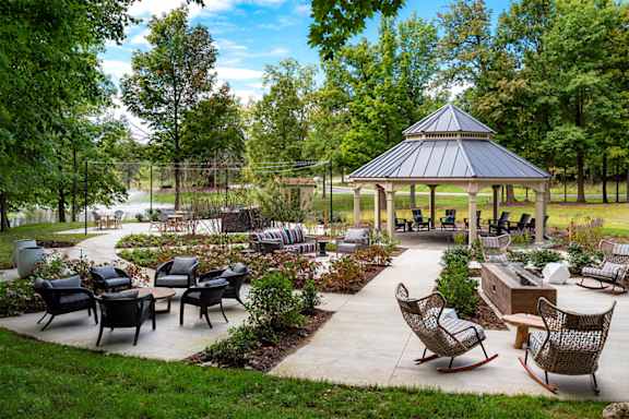 a patio with chairs and a gazebo in a park  at Ascent at Farmington Hills, Farmington Hills, MI, 48331