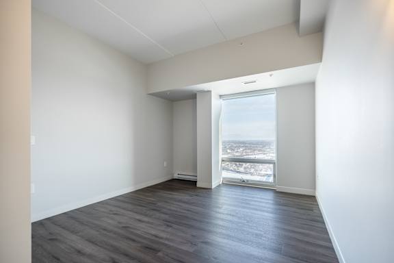 Empty room with a view of the city.