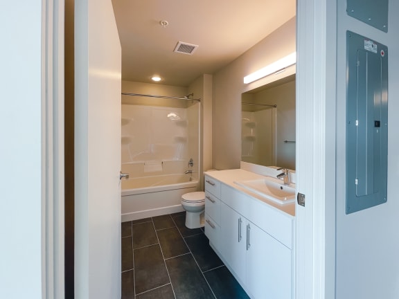 a bathroom with a toilet sink and bathtub