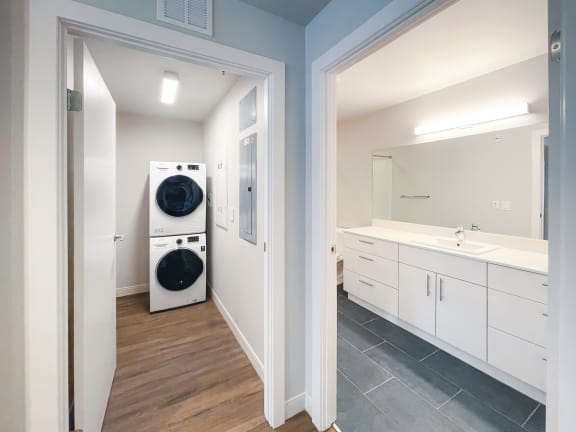 a bathroom with a washer and dryer