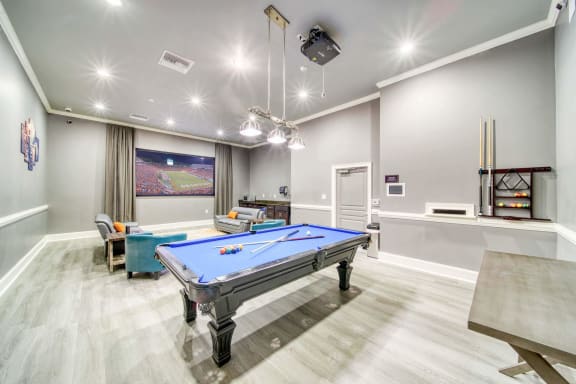 a games room with a pool table and ping pong table at Meridian Obici, Suffolk, VA
