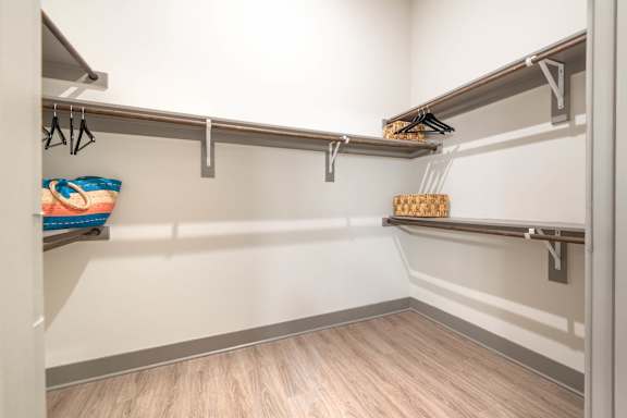 A walk-in closet at The Bridge at McKinney, Texas