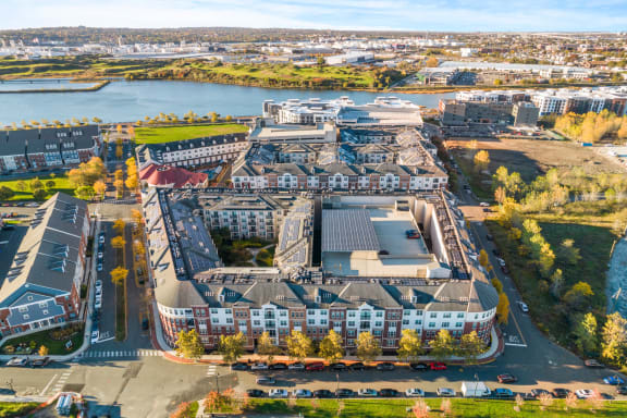 an aerial view of a city with buildings and a riverat Harbor Pointe, Bayonne, NJ