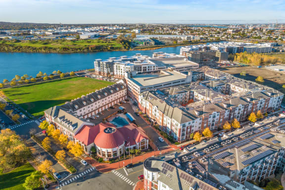 an aerial view of a city with buildings and a riverat Harbor Pointe, Bayonne, NJ, 07002