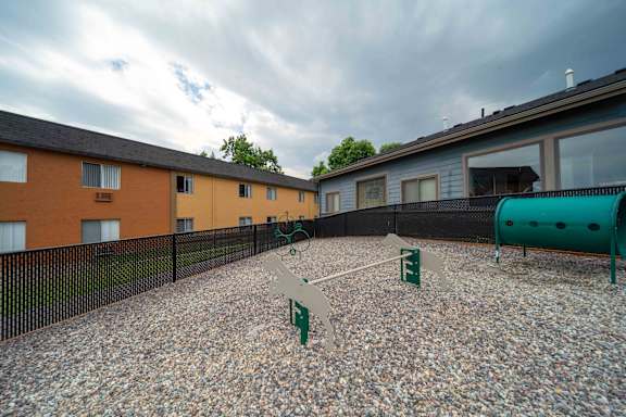 Dog in the dog park at Mountain Vista Apartments, Colorado