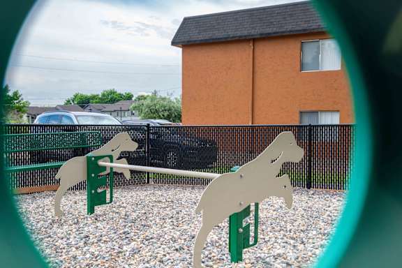 Dog in the park at Mountain Vista Apartments, Lakewood