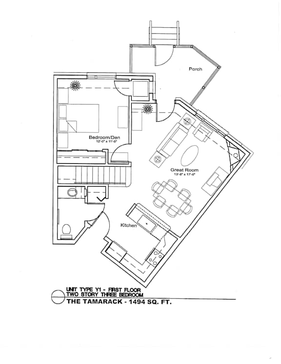 A floor plan of a house with a porch, great room, and kitchen.