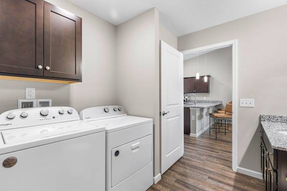 A laundry room with a washer and dryer.